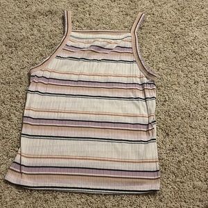 Color pattern of light purple, black, Tan, pink, light orange.